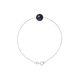Le bracelet TÉA de Perlinea, fabriqué en argent 925 et orné d'une perle de culture noire de Tahiti au centre, met en valeur l'élégance artisanale française grâce à un fermoir à mousqueton sécurisé.