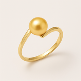 Bague zigzag en or jaune 9 carats sertie d'une perle de culture dorée.