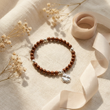 Bracelet perles d'eau douce chocolat argent 925 avec charm trèfle porte-bonheur.