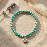 Bracelet perles d'eau douce bleu turquoise argent 925 avec charm trèfle porte-bonheur.