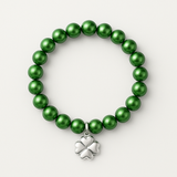 Bracelet perles d'eau douce vertes intenses avec pendentif trèfle en argent 925.