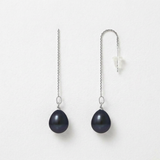 Boucles d'oreilles pendantes or blanc 9 carats avec perles de culture noires de Tahiti.