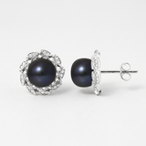 Boucles d'oreilles argent 925 à perles noires de Tahiti serties dans un cadre floral avec zircons.