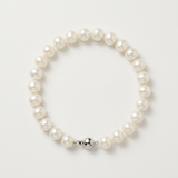 Bracelet perles blanches 8/9 mm en argent 925 avec fermoir boule argenté.