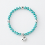 Bracelet perles d'eau douce bleu turquoise argent 925 avec charm trèfle porte-bonheur.