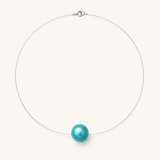 Collier argent 925 fil fin avec une perle ronde turquoise en pendentif central.