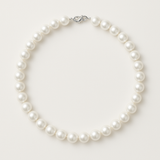 Collier de perles blanches 9/10 mm sur argent 925 avec fermoir mousqueton.